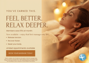 A woman is lying on a massage table with her eyes closed while a therapist massages her shoulders; West Seattle Massage Therapy offers discounted massage services.